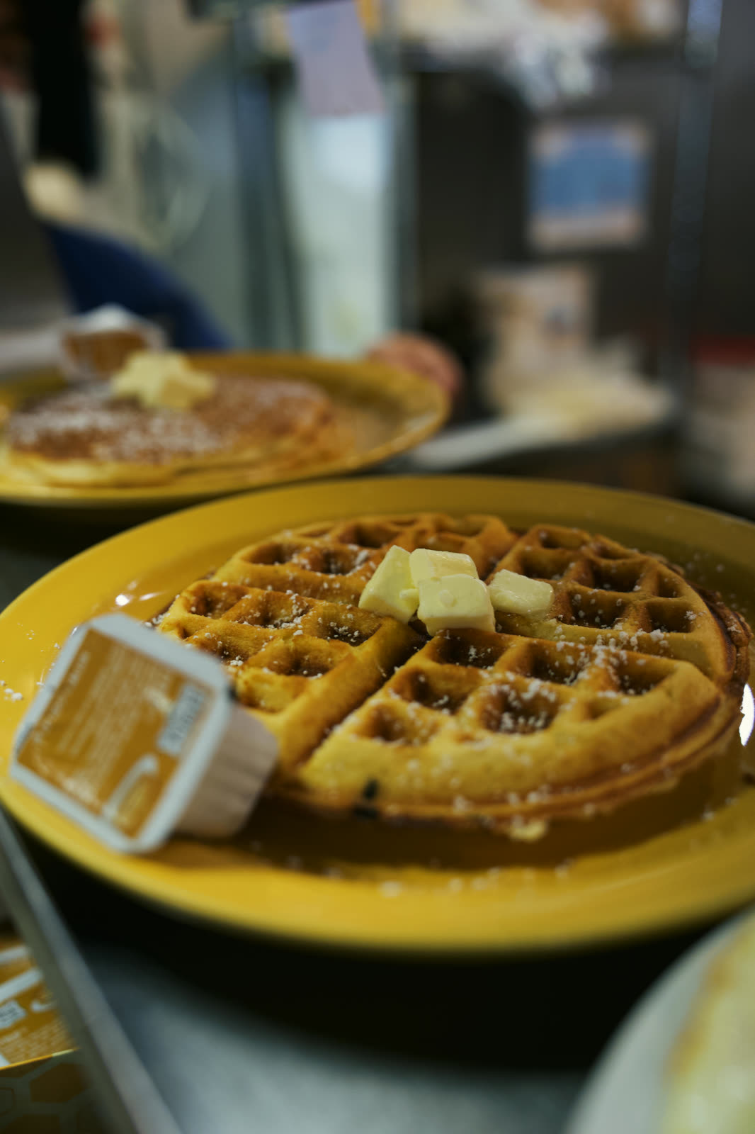 Golden waffle with melting butter